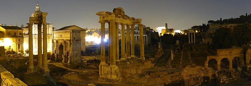 Night view of the Rome's historical forum, temple of Saturn in foreground